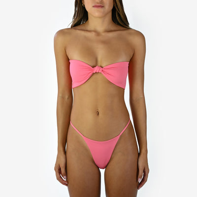 Bare All Swimwear Knot Bandeau Top in Rosa, front view on model